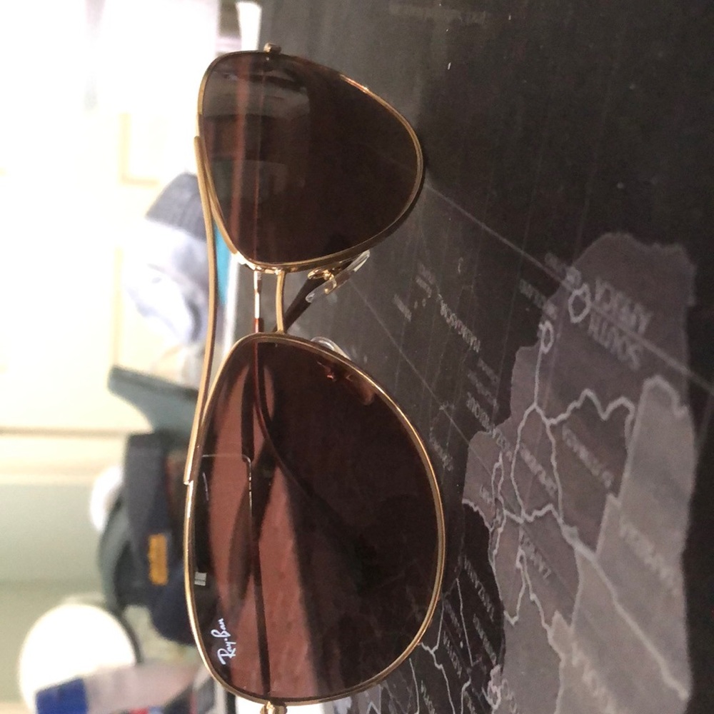 Brand new. No scratches,  gold with brown and case